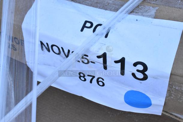 Label on a cardboard box showing "POI NOV25-113 876" with a blue dot, indicating auction lot details.