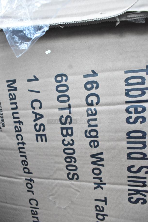 Cardboard box displaying text "16 Gauge Work Table 600TSB3060S." Perfect for new scratch and dent item lot.