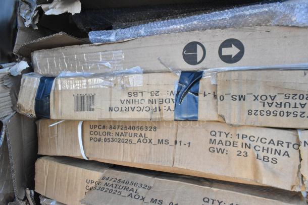 Cardboard boxes labeled with UPC 847254056328, color natural, containing scratch and dent table bases, made in China.