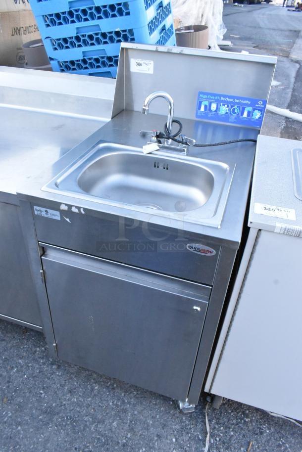 QualServ stainless steel portable sink on commercial casters, 120 volts, 1 phase; includes faucet and storage, good condition.