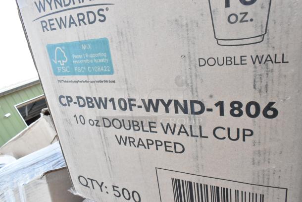 Cardboard box of 10 oz double wall cups, model CP-DBW10F-WYND-1806, 500 count, FSC certified, for auction.