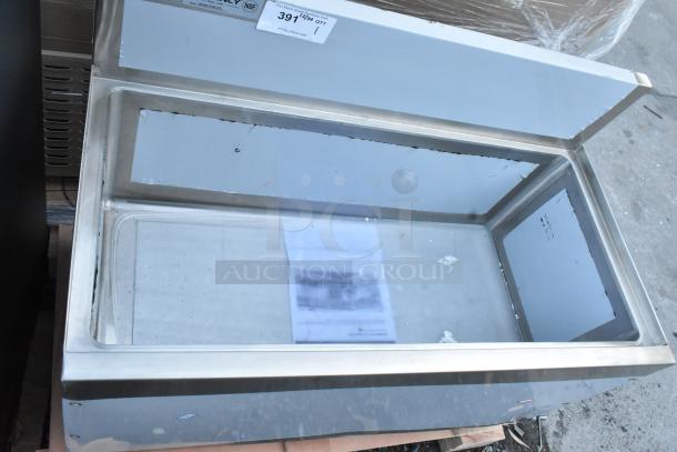 Brand new Regency 600IB1936CPS 19"x36" underbar ice bin with 10 circuit cold plate, bottle holders, and visible scratches.
