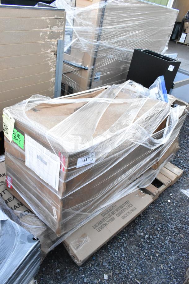 Plastic-wrapped pallet with brown boxes, containing 4 new scratch and dent items including a bun rack and chair frame, marked “393” x4.