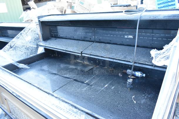 Killion PFW-74-43-48-V-N-MOBILE metal merchandiser, open design, 208/230V, 1 phase. Visible shelving, moderate wear.