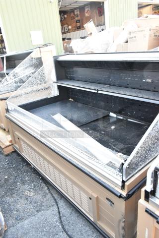 Killion PFW-74-43-48-V-N-MOBILE metal open merchandiser. Features glass panels, shelving, and 208/230V power. Good condition.