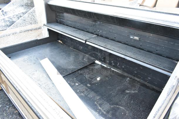 Killion PFW-74-43-48-V-N-MOBILE metal open merchandiser. Features durable shelves and 208/230V requirement. Good condition.