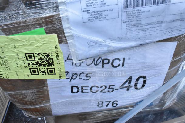 Pallet with 6 new scratch and dent items, visible shipping labels, barcode, and notes indicating 2 pieces, DEC25-40.