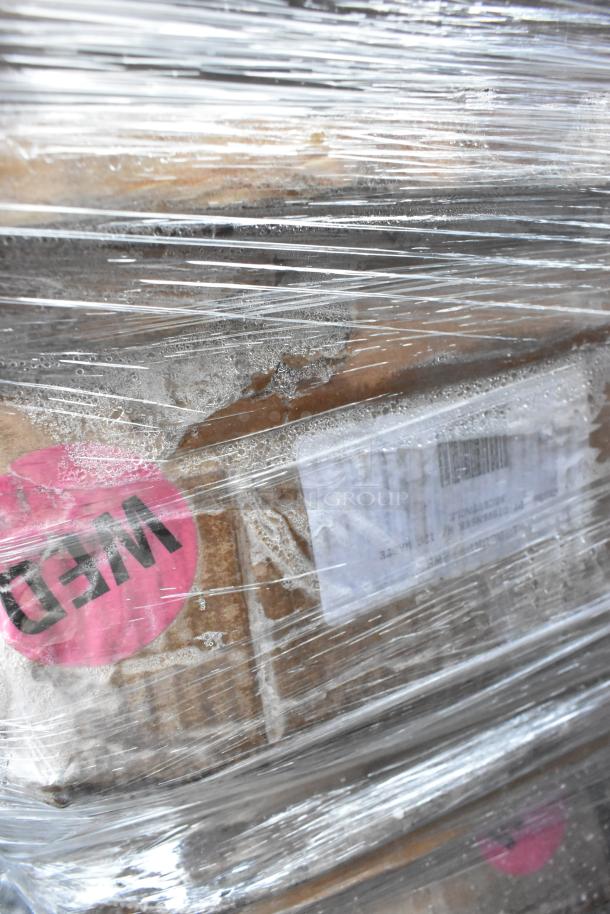 Plastic-wrapped pallet with scratch and dent items, labeled "MED." Contains shelves, offers potential 6x bid value.