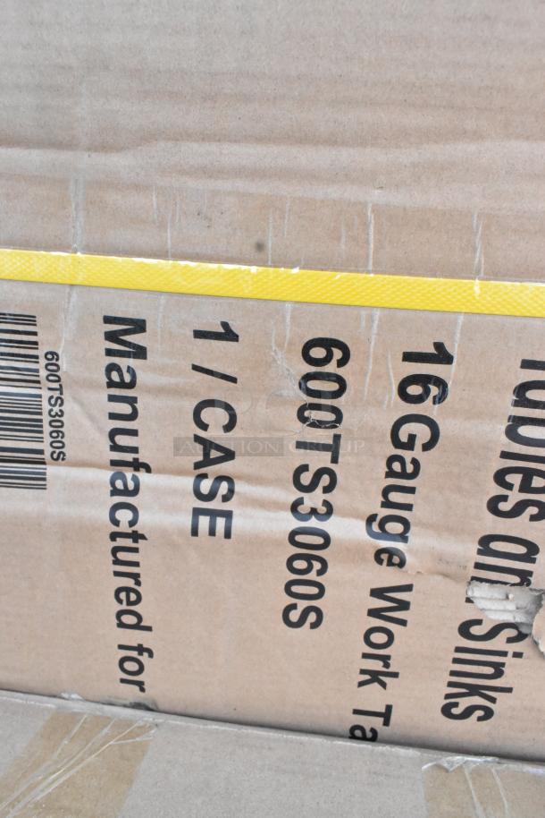 Cardboard box showing model 600TS3060S, labeled as 16 Gauge Work Table. Box appears slightly damaged.