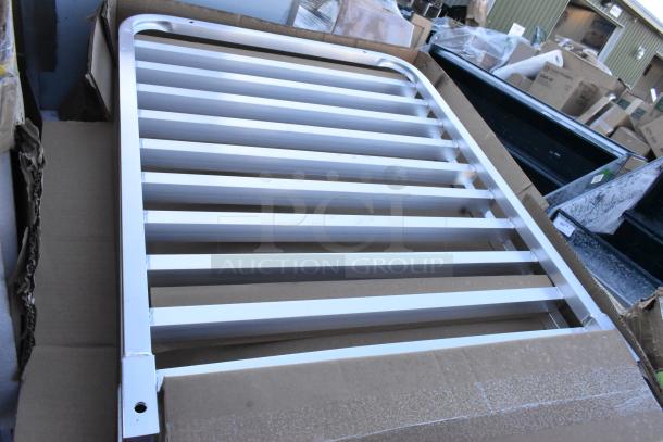 Brand new bun rack in white, scratch and dent condition, packaged in a cardboard box.
