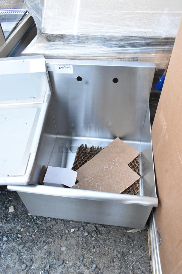 Brand new Steelton 24" x 24" x 14" utility sink with no legs; features holes for 8" center faucet. Scratch and dent condition.