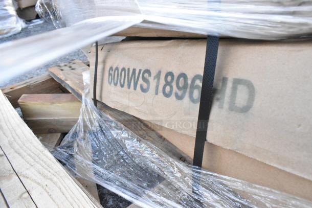 Pallet with 5 brand new scratch-and-dent items, including wall shelves and trash liner, marked "600WS1896HD", wrapped in plastic.