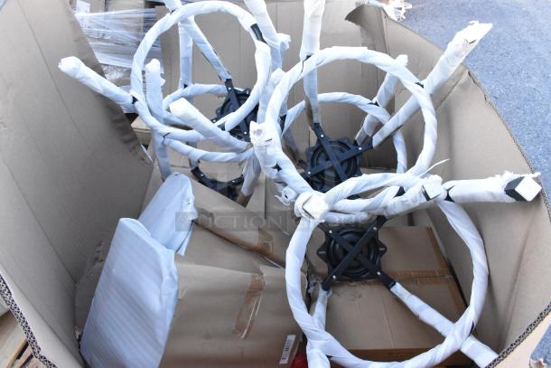 9 brand new scratch and dent stool frames in packaging, showing metal bases and wrapped components, ready for assembly.
