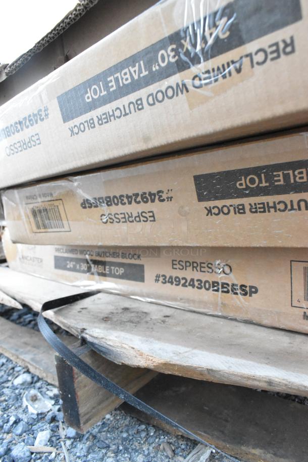 Boxes of brand new scratch and dent items on a pallet, including "Reclaimed Wood Butcher Block" tabletop, 24"x30", Espresso.