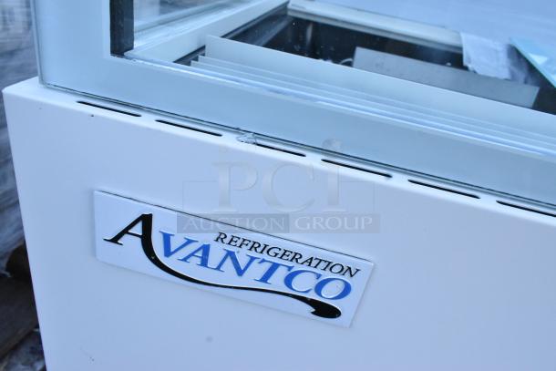 Avantco 193BCF48W bakery display case, white, 47" with visible scratch and dent, broken glass visible. 110-120V, 1 Phase.