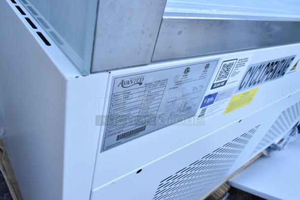 Brand new Avantco refrigerated bakery display case, model 193BCF48W, with broken glass. Label shows 110-120V, 1 phase.
