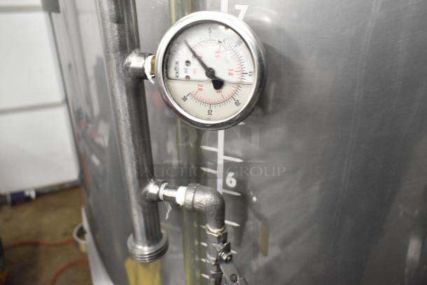 Stainless steel 8.75 BBL beer tank with pressure gauge, liquid level indicators, used for tax determination, 367 gallons capacity.