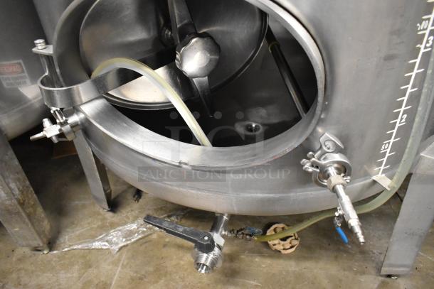 Stainless steel 8.75 BBL beer tax determination tank, features clear beer sight gauge, intake valves, and calibration markings.