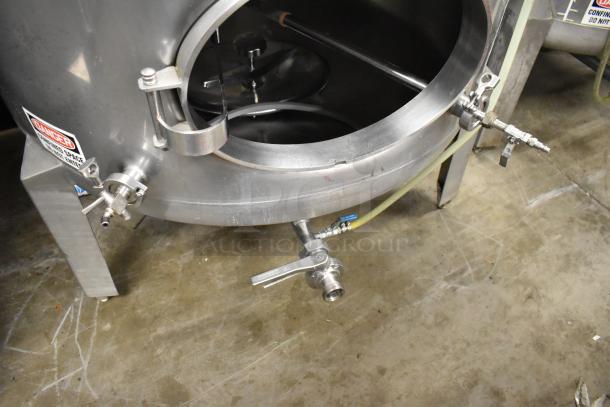 Stainless Steel 8.75 BBL / 367 Gallon beer tank, floor model, with visible ports and "DANGER" label, used condition.