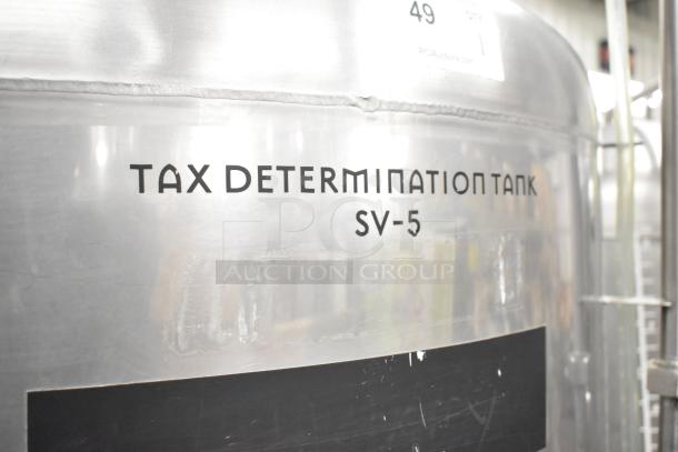 Stainless steel 8.75 BBL/367 gallon commercial tax determination tank with "SV-5" marking, used for beer processing.