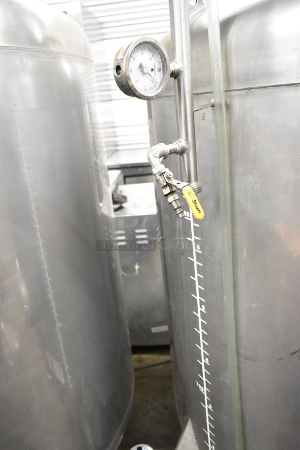 Stainless steel 8.75 BBL / 367-gallon beer tax determination tank with gauge and valve; commercial use; clear markings.