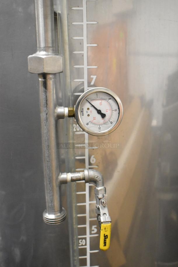 Stainless steel 8.75 BBL/367-gallon beer tax determination tank with gauge, numbered markings, and valve; used condition.
