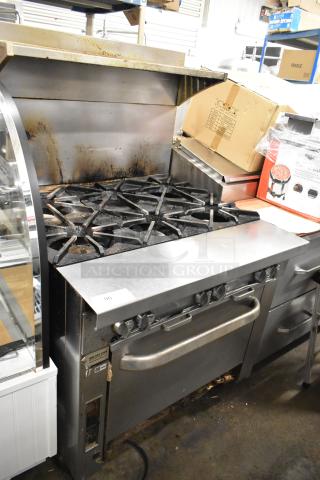 Southbend Stainless Steel Commercial Natural Gas Powered 6 Burner Range w/ Oven and Back Splash. - Item #1226612