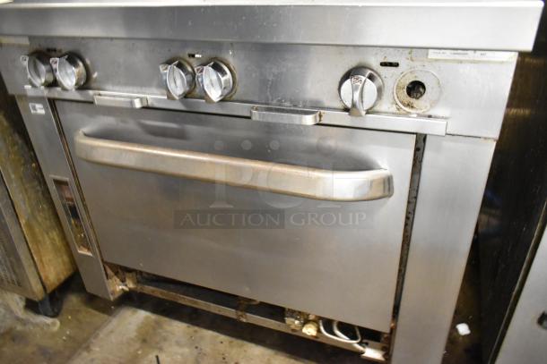 Southbend P36G-BBB stainless steel 6 burner range with oven, natural gas, commercial use, visible wear, model P36G-BBB.