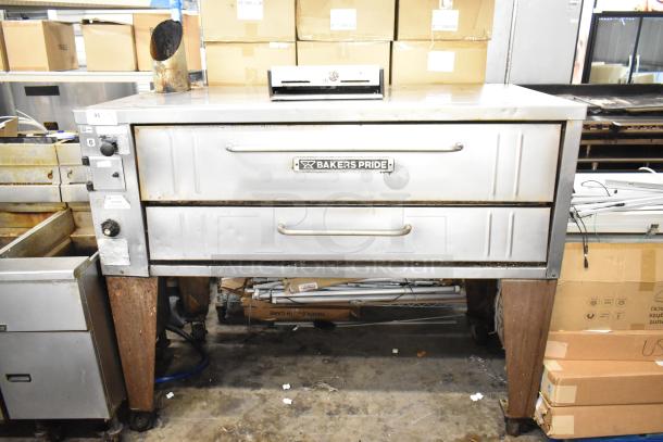 Bakers Pride 4151 stainless steel single deck pizza oven, natural gas, 70,000 BTU, fair condition, with visible controls.