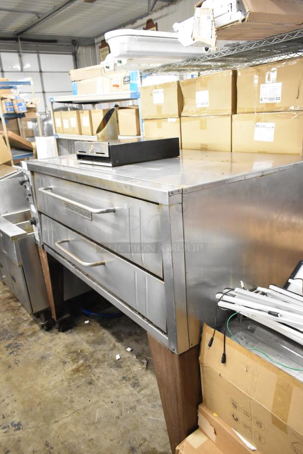Bakers Pride 4151 stainless steel single deck pizza oven on legs, natural gas, 70,000 BTU, commercial use.