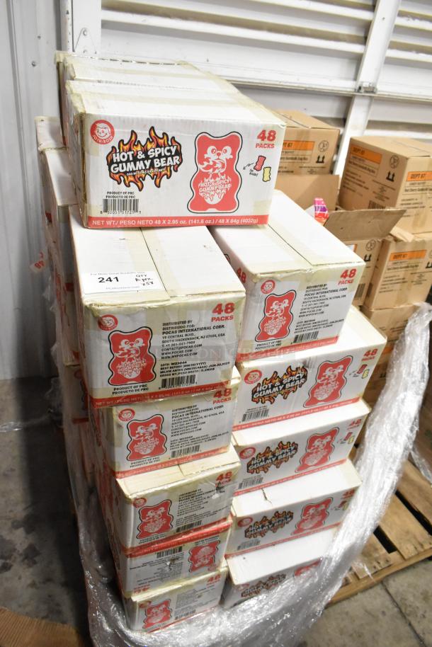 58 boxes of Hot and Spicy Gummy Bears, each containing 48 packs. Boxes show product branding and nutritional details.