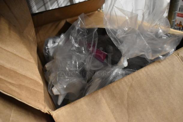 Cardboard box with 53 assorted bottles, including Clorox Anywhere Disinfectant, in plastic bags. Sanitizer sprays included.