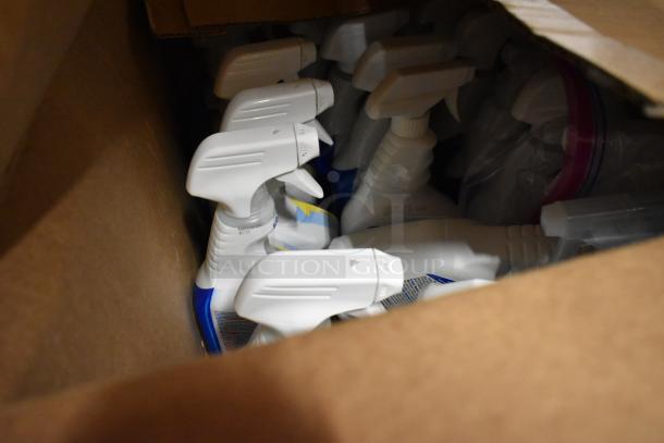 Box containing 50 bottles of various cleaners, featuring Clorox Clean Up Disinfectant with Bleach. Bottles have trigger spray tops.