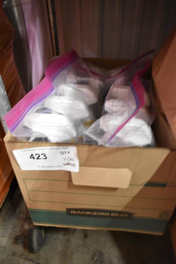 Box containing 50 bottles of various cleaners, including Clorox Clean Up with bleach, labeled "423, Qty 50" for auction.