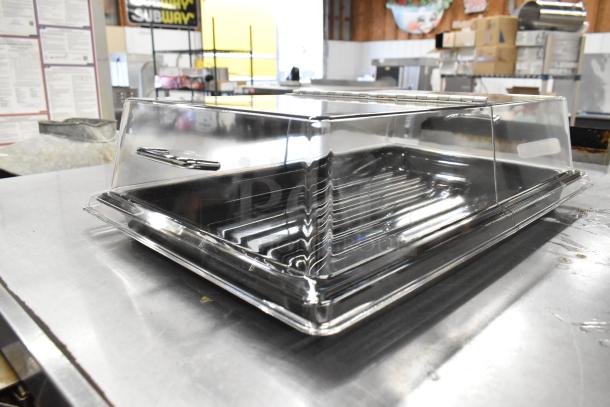 72 new scratch and dent boxes featuring Cambro RD1220CWH135 rectangular hinged display cover and DT1220CW110 market tray.