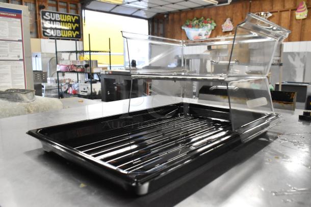 Cambro RD1220CWH135 clear hinged display cover on a black DT1220CW110 polycarbonate tray, 12x20", new condition.