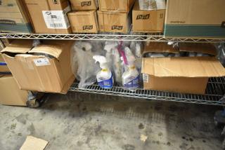 58 bottles of various cleaners, including Clorox Clean Up Disinfectant Cleaner with Bleach, in assorted packaging.