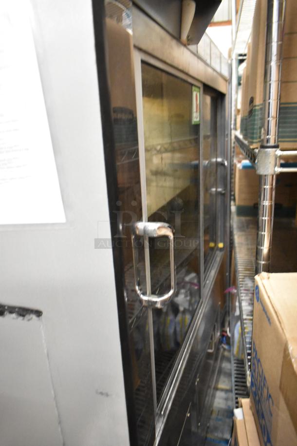 Metal Commercial Horizontal Grab N Go Merchandiser with glass door, visible handle. Used condition, ideal for retail display.