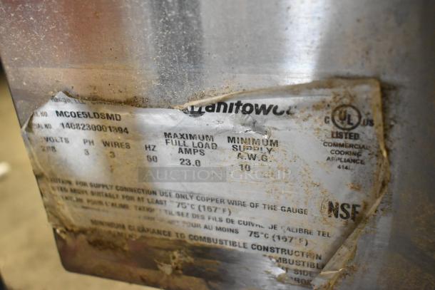 Garland MCOE5LDSMD stainless steel half-size convection oven label, showing 208V, 3-phase specs, NSF and UL markings.