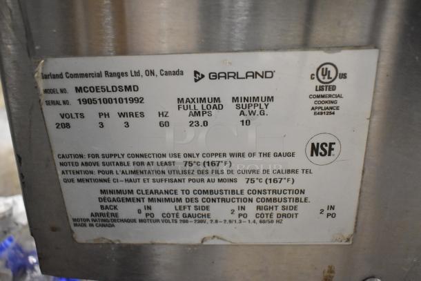 2019 Garland MCOE5LDSMD convection oven label, showing specs: 208 volts, 3 phase, 23 amps, NSF and UL-listed.