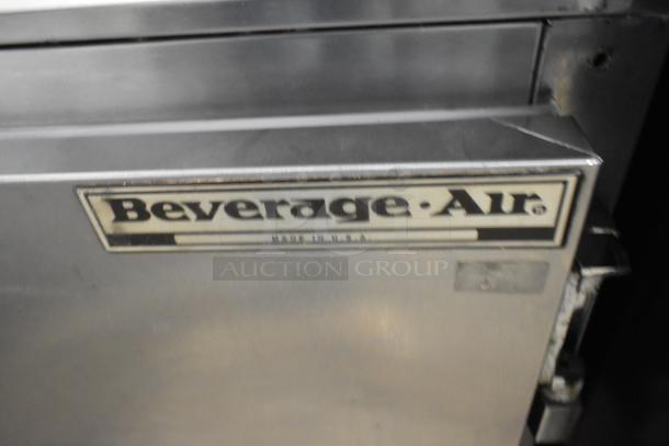 Beverage Air UCR48A stainless steel 2-door undercounter cooler, shown with logo. Features commercial casters, 115V, 1 Phase.