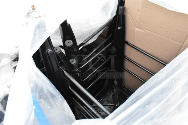 16 new Lancaster Table & Seating Alloy Onyx Black outdoor backless stools, counter height, in original packaging.