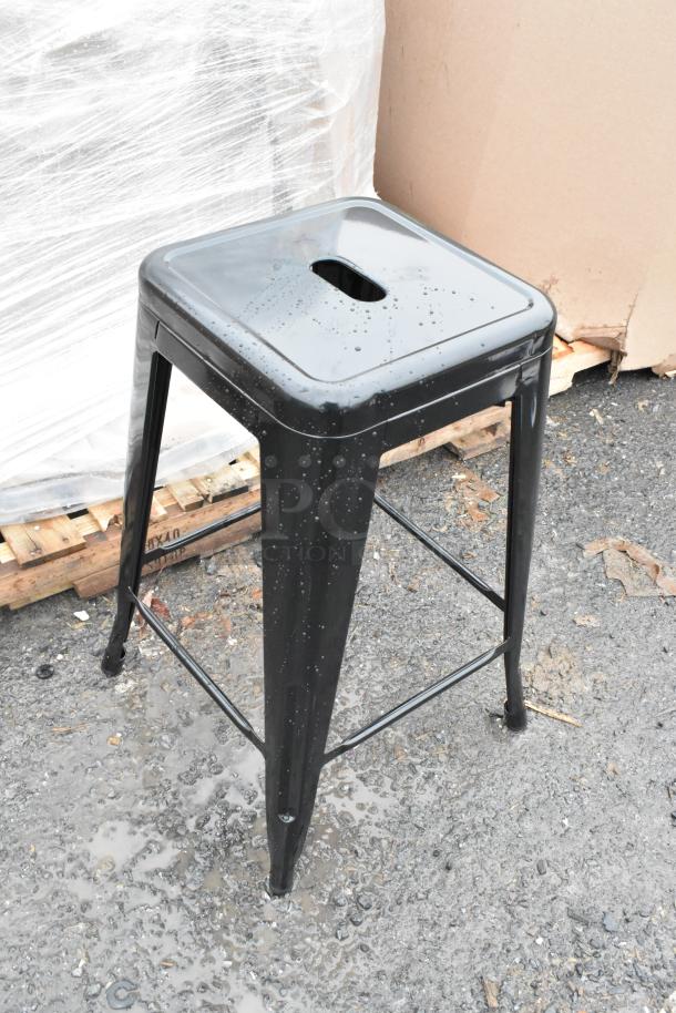 Brand new Lancaster Table & Seating Alloy Onyx Black outdoor backless counter height stool, scratch and dent condition.