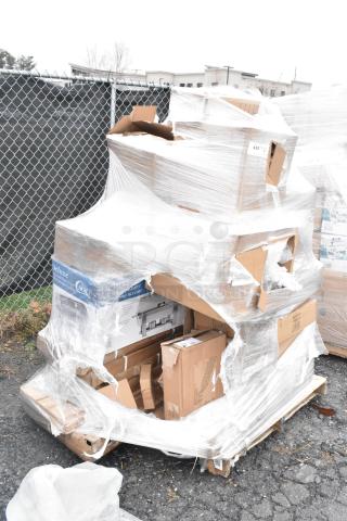 Pallet with 25 new scratch and dent items, including spatulas, sinks, and a chafer, wrapped in plastic.