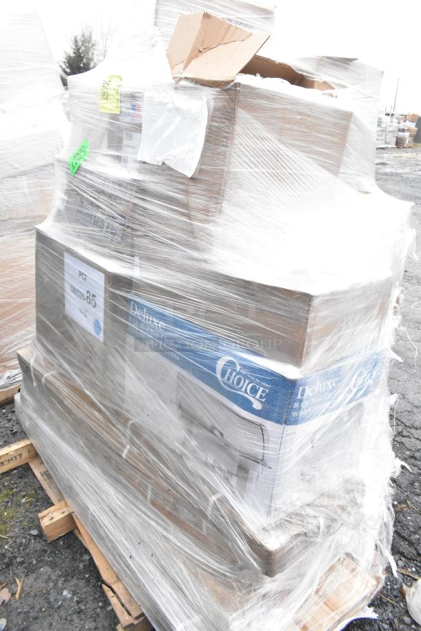 Plastic-wrapped pallet containing new scratch and dent items including spatulas, sinks, and a Choice Deluxe chafer. Boxes labeled.