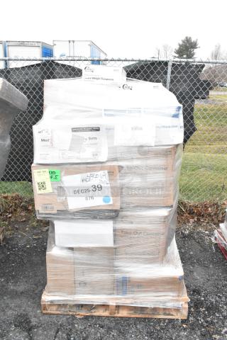 Pallet of assorted scratch and dent items, including containers and towels, wrapped in plastic. Labels indicate 28 items per bid.