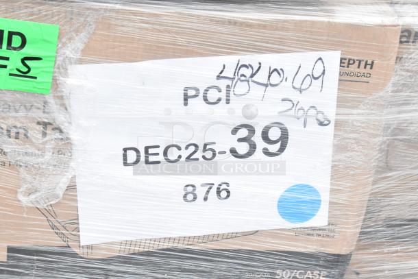 Plastic-wrapped pallet labeled "DEC25-39 876" containing an assortment of scratch and dent items, including containers, towels, and bags.