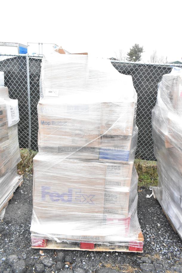 Pallet of 23 scratch and dent items, including sealed boxes labeled "FedEx" and "Mop Bucket," wrapped in plastic.