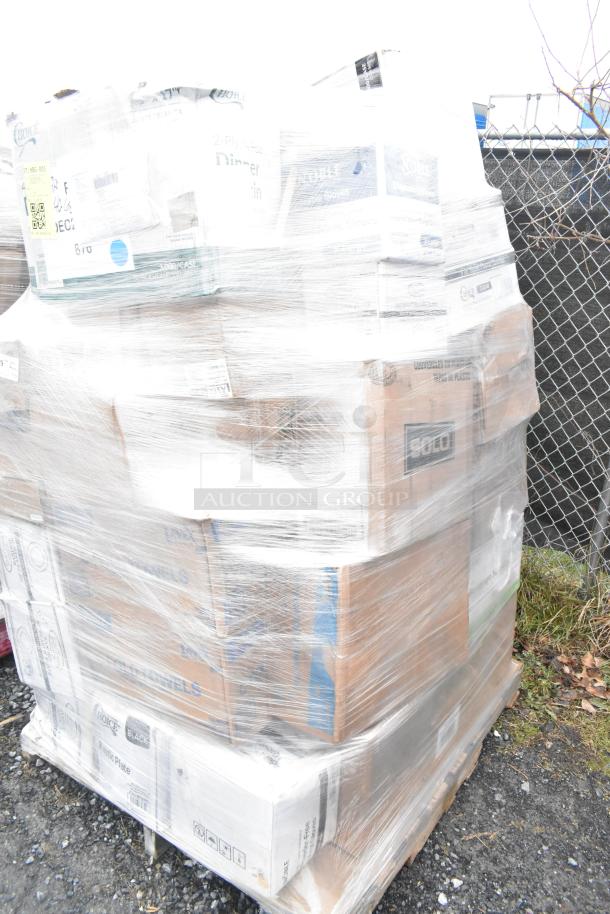 Pallet of 42 mixed brand new scratch and dent items, including towels and plastic tumblers, wrapped in clear plastic.