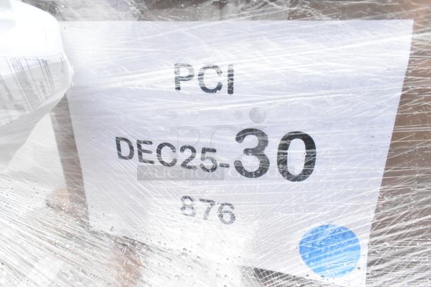 Wrapped pallet showing a label with text "PCI DEC25-30 876." Contains scratch and dent items including glasses and table legs.